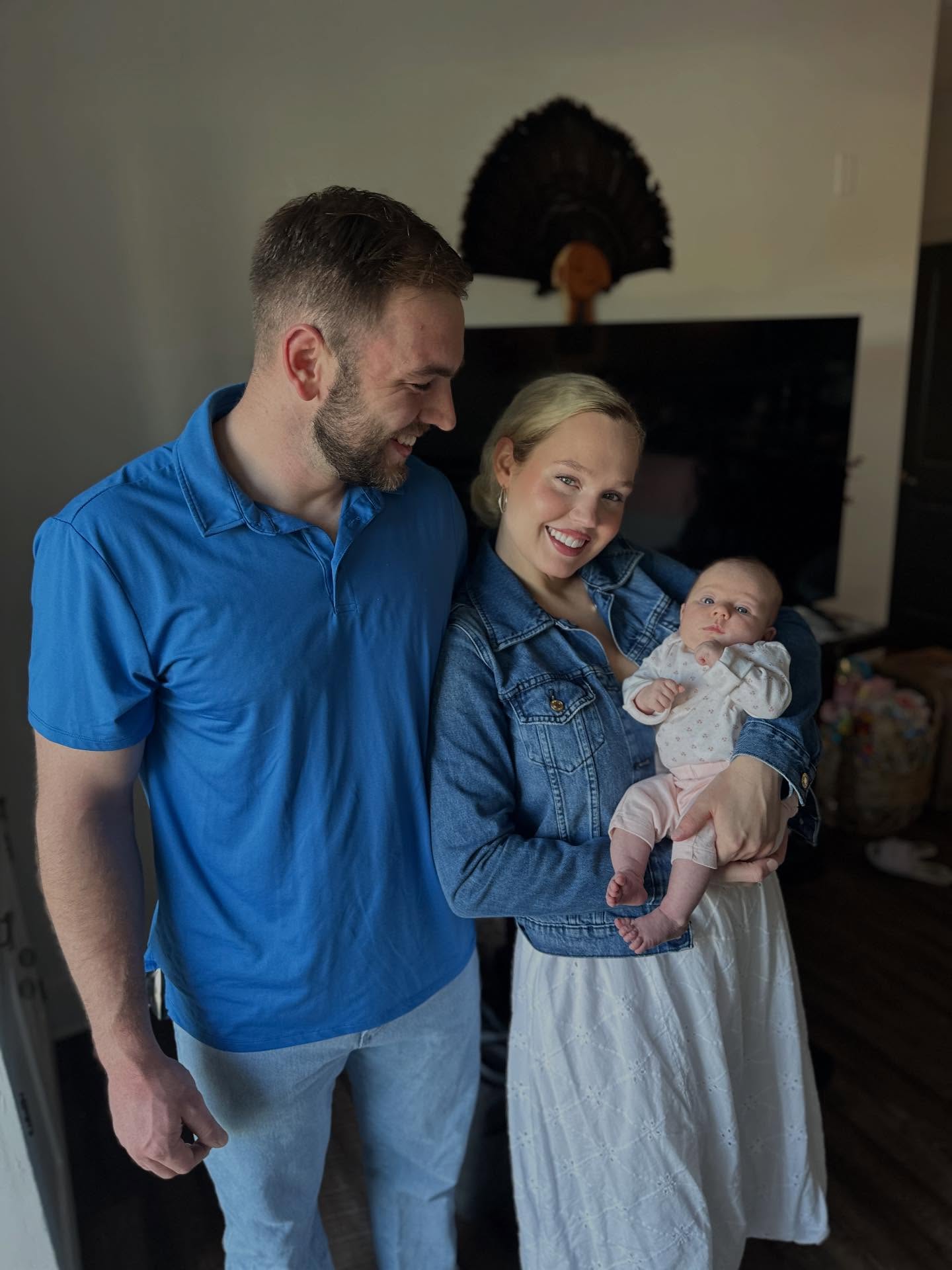 Connor Williams and Estee with their daughter.