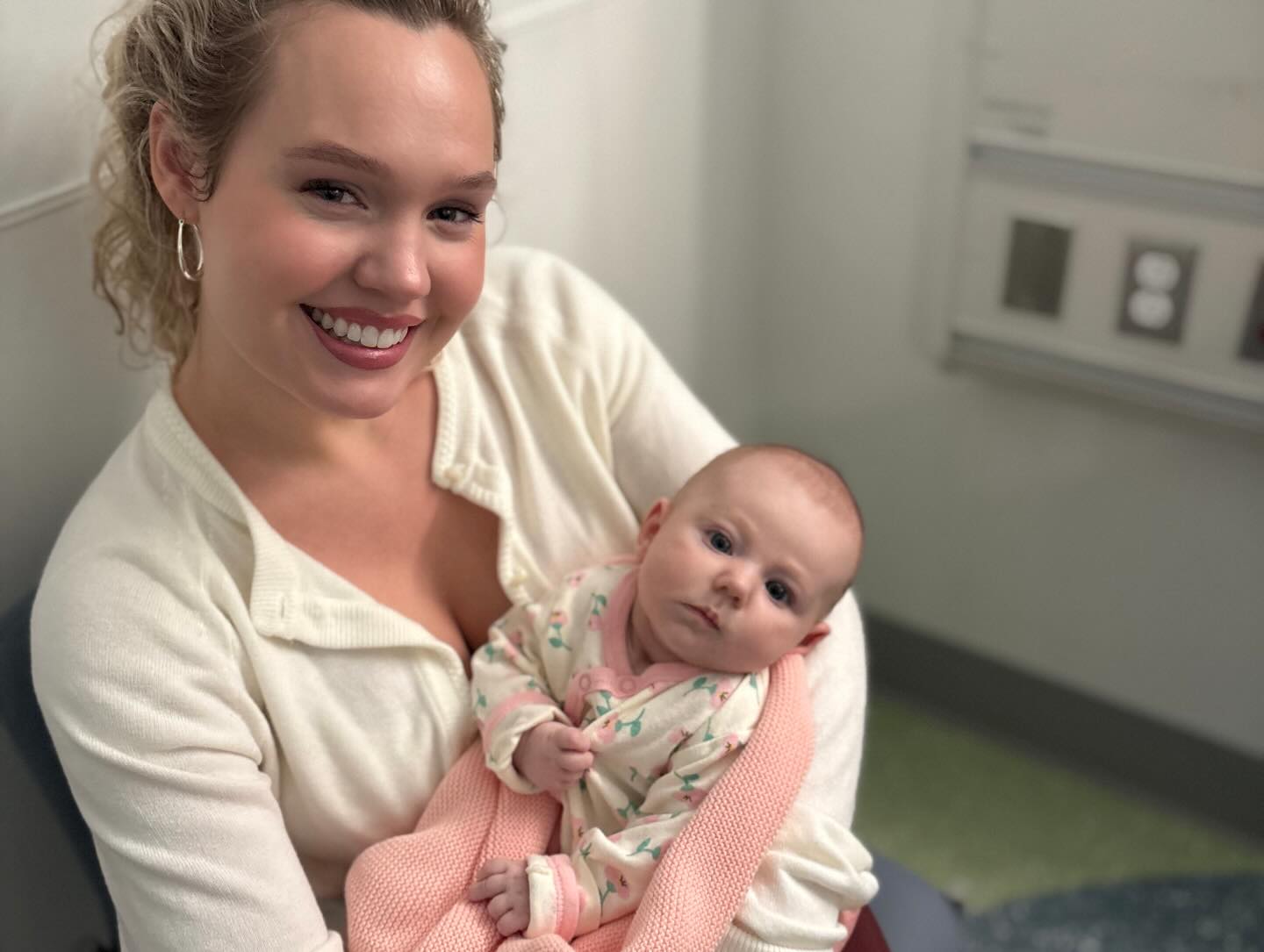 Estee Williams holding her baby daughter.