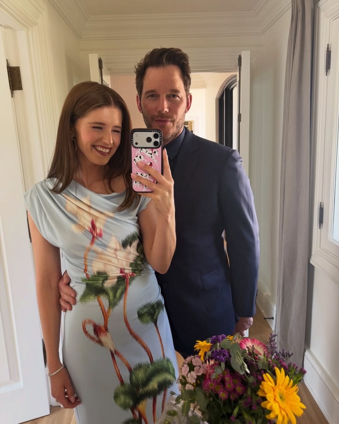 Katherine Schwarzenegger taking a mirror selfie with Chris Pratt.