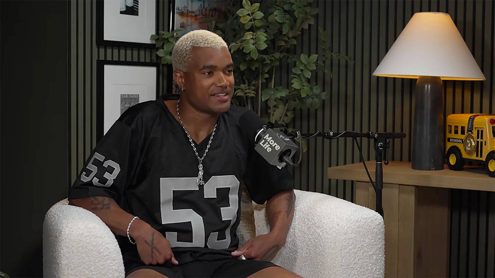 KJ Dillard in a black jersey with 