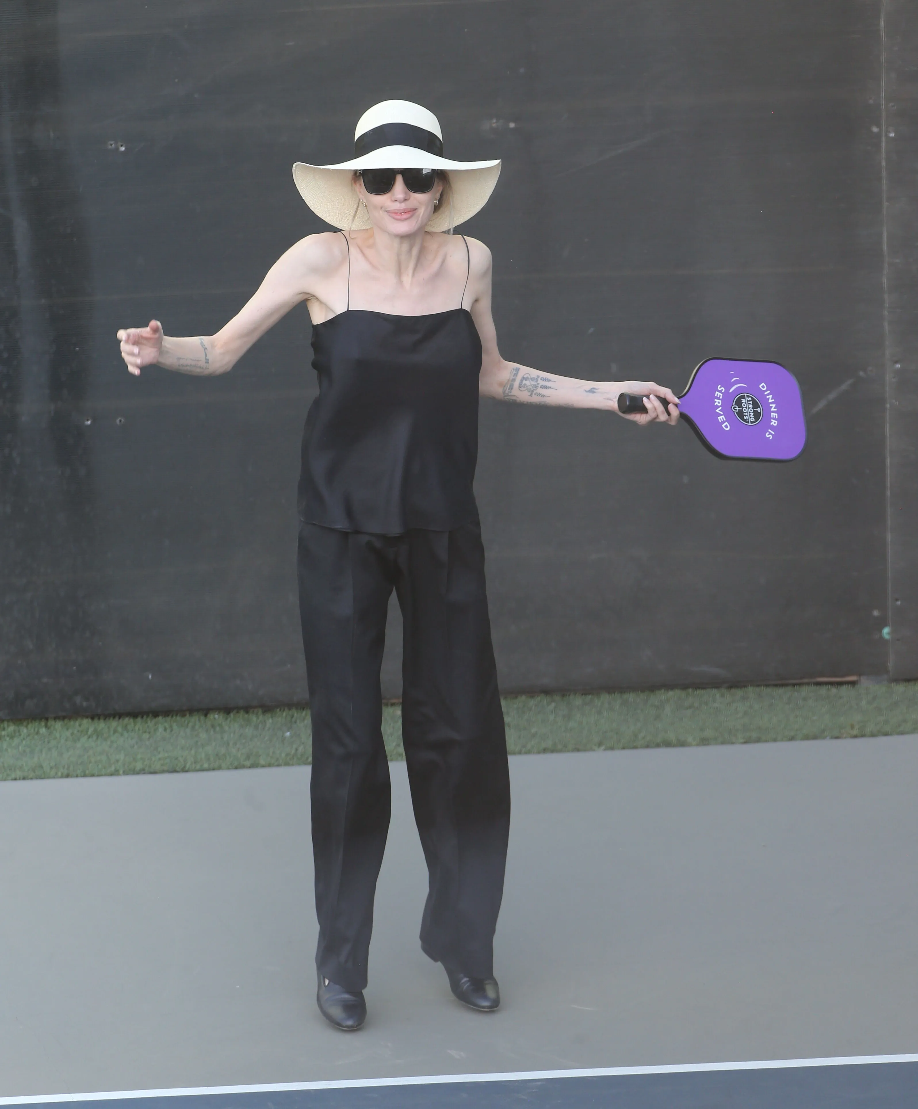 Angelina Jolie playing pickleball.