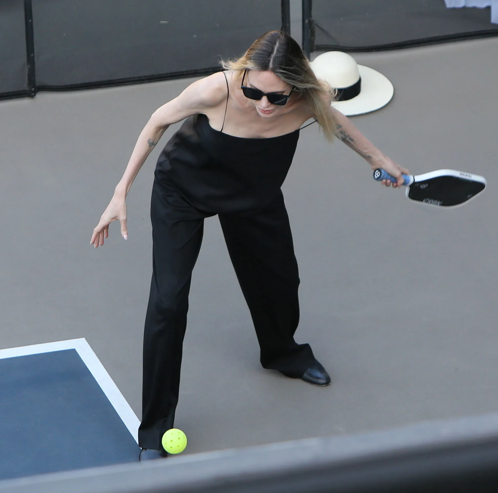 Angelina Jolie playing pickleball.