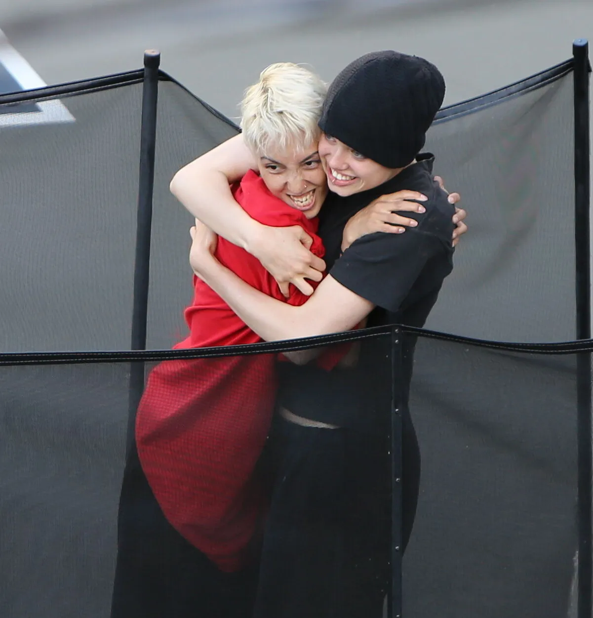 Shiloh Jolie-Pitt embracing Keoni Rose.