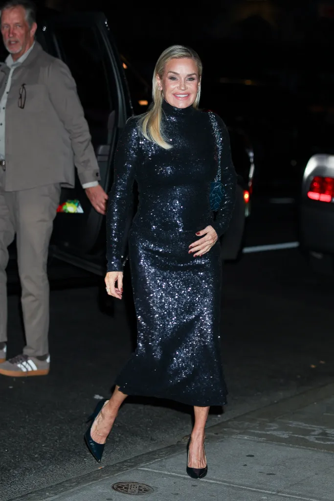 Yolanda Hadid in a black sequined dress.