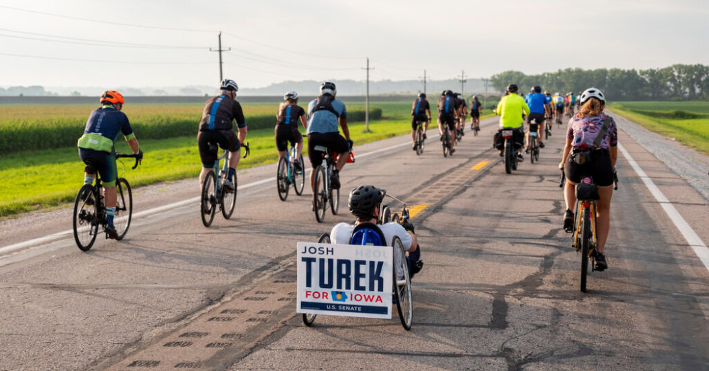 In Iowa, a Democrat’s Uphill Battle for Senate Comes With Wheels