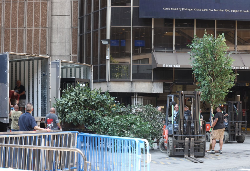 Trucks loading wedding equipment at Madison Square Garden.