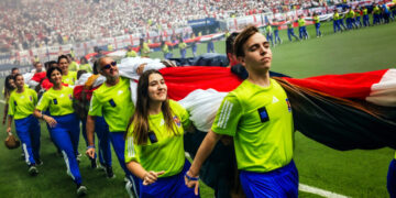It Takes Coordination (and Many Arms) to Unfurl a World Cup Flag