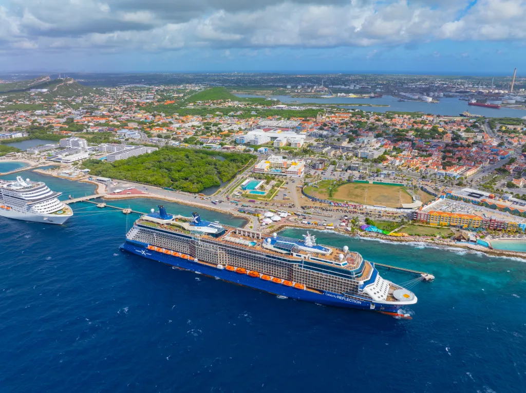 Aerial view of the Celebrity Reflection cruise ship docked at the Curacao Cruise Terminal in Willemstad.