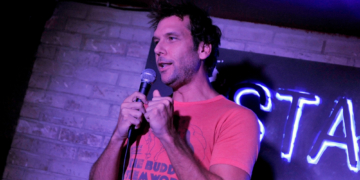 14 Years Ago, Dane Cook Made a Wild ‘Dark Knight Rises’ Joke Days After the Aurora Theater Shooting