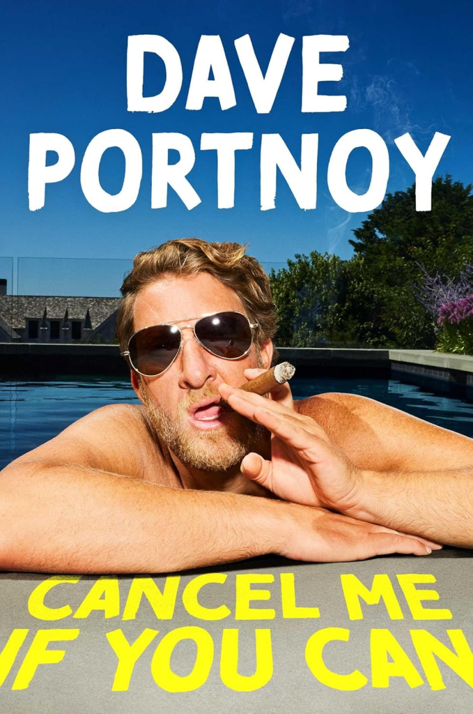 Dave Portnoy wearing sunglasses and smoking a cigar in a swimming pool, with