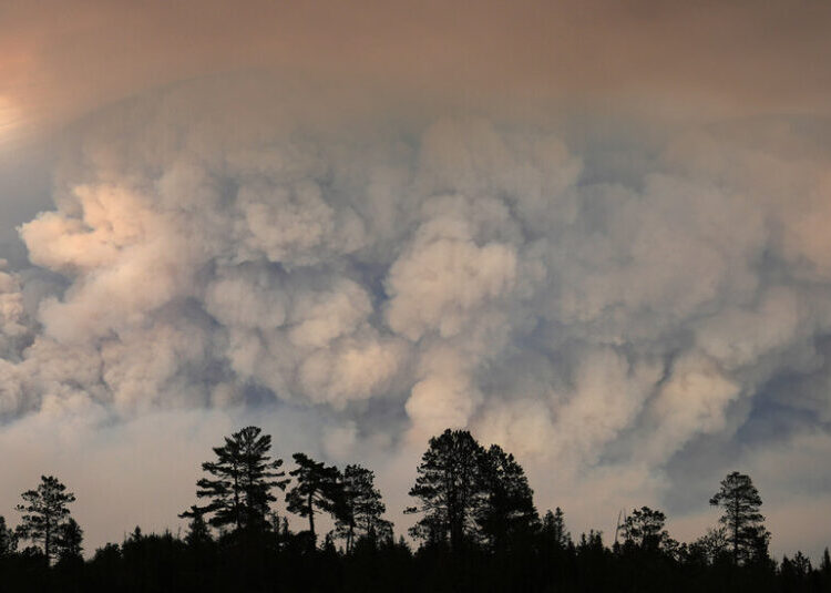 Fire in National Forest Pocked by Blazes Crosses Into Canada