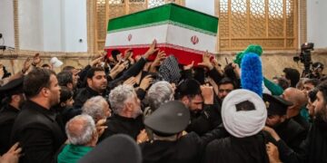 Iran’s supreme leader vows revenge for killing of his father after Trump threatens to launch thousands of missiles if Tehran tries to assassinate him
