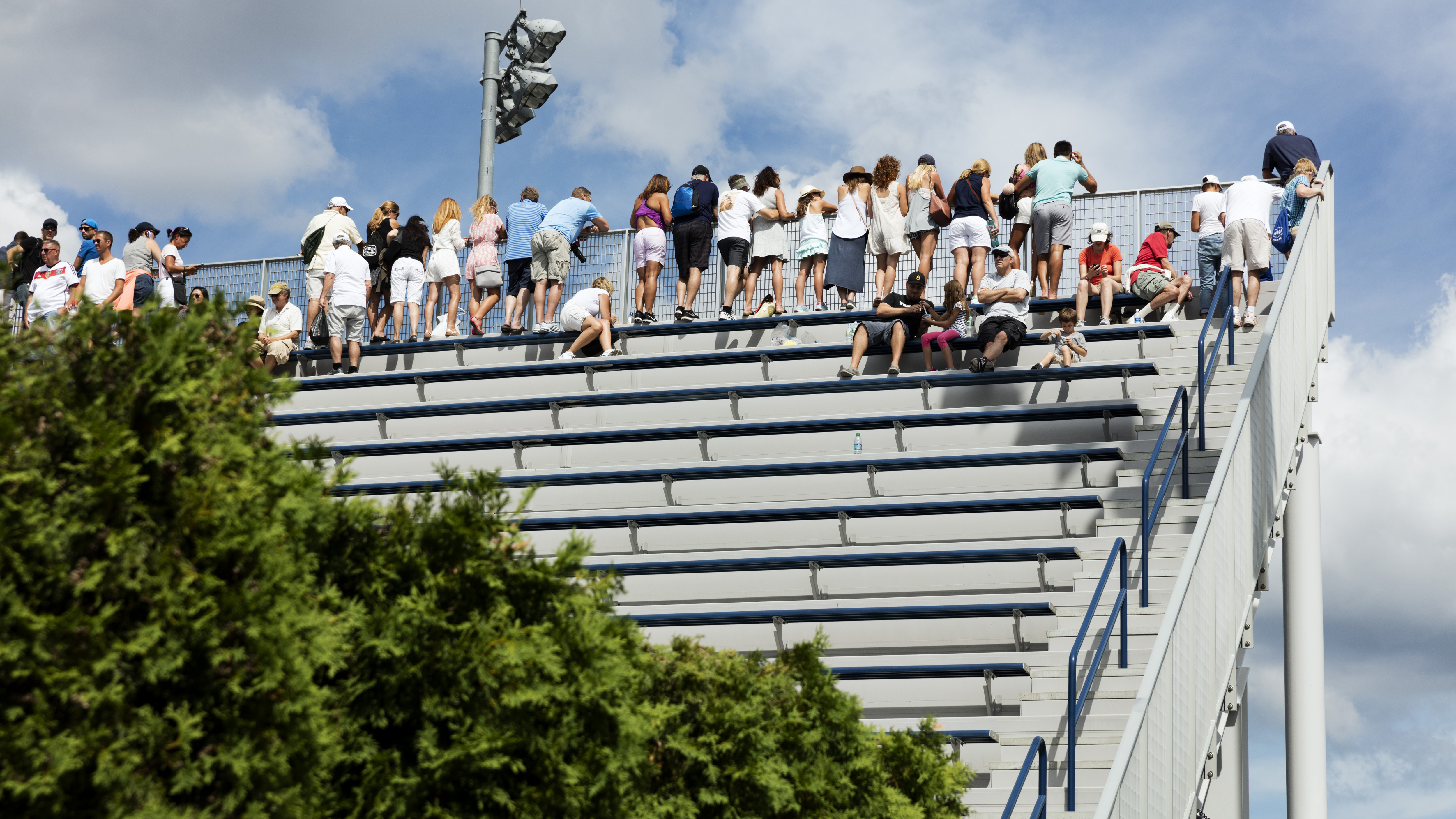 An image of spectators on the bleachers