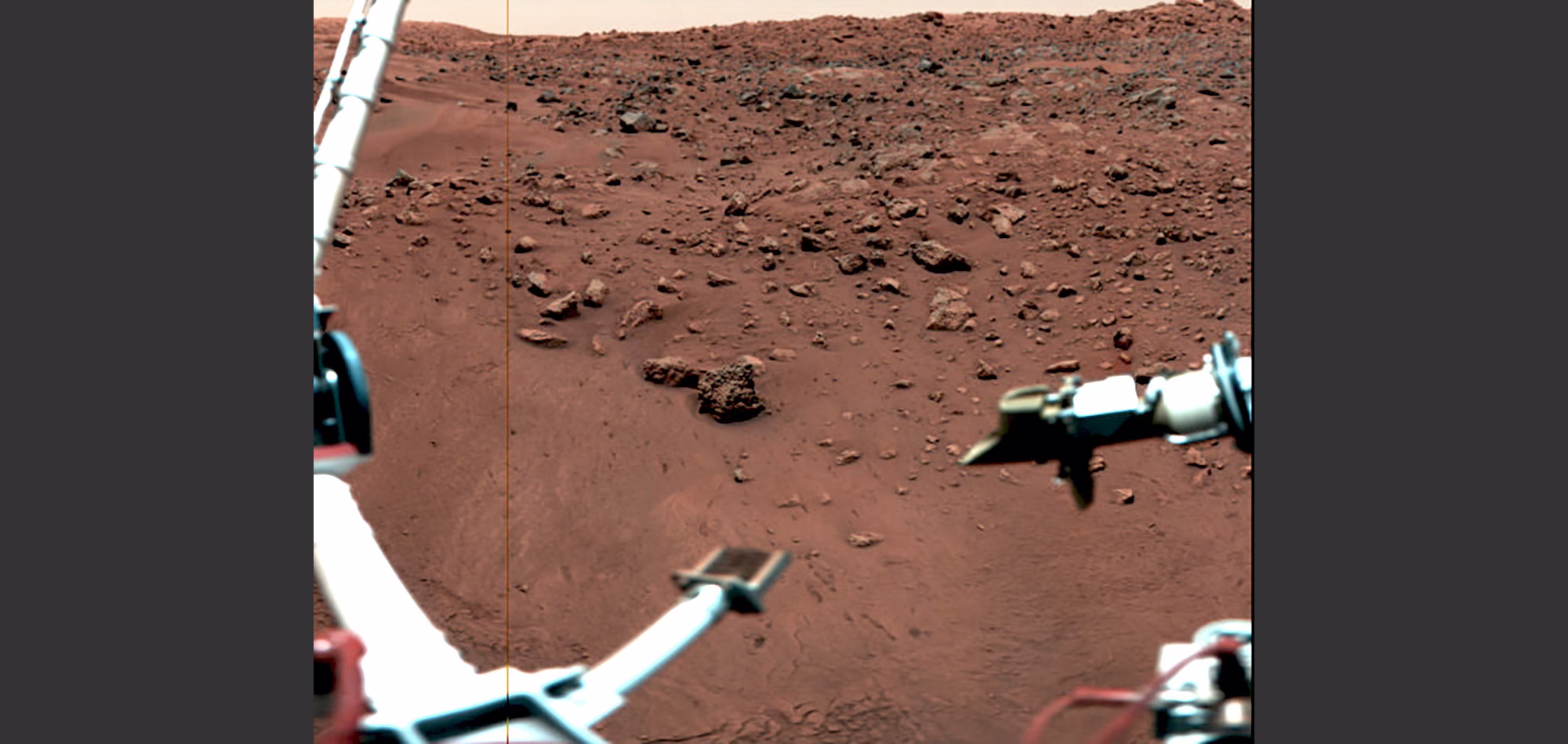Several instruments aboard Viking 1, seen above the reddish-colored surface of Mars