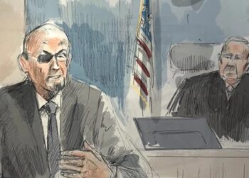 Salman Rushdie describes a ‘lake of blood’ as his convicted attacker faces terrorism charges tied to the 2022 stabbing