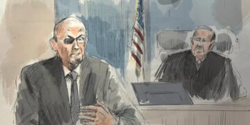 Salman Rushdie describes a ‘lake of blood’ as his convicted attacker faces terrorism charges tied to the 2022 stabbing
