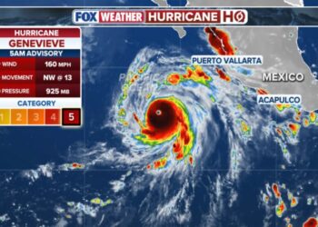 Major Hurricane Genevieve roars in the Pacific as Fausto weakens to a tropical storm near Hawaii