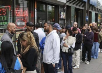 The rise of ‘conspicuous waiting’: The 19th-century economic theory that explains why Gen Z posts their place in line