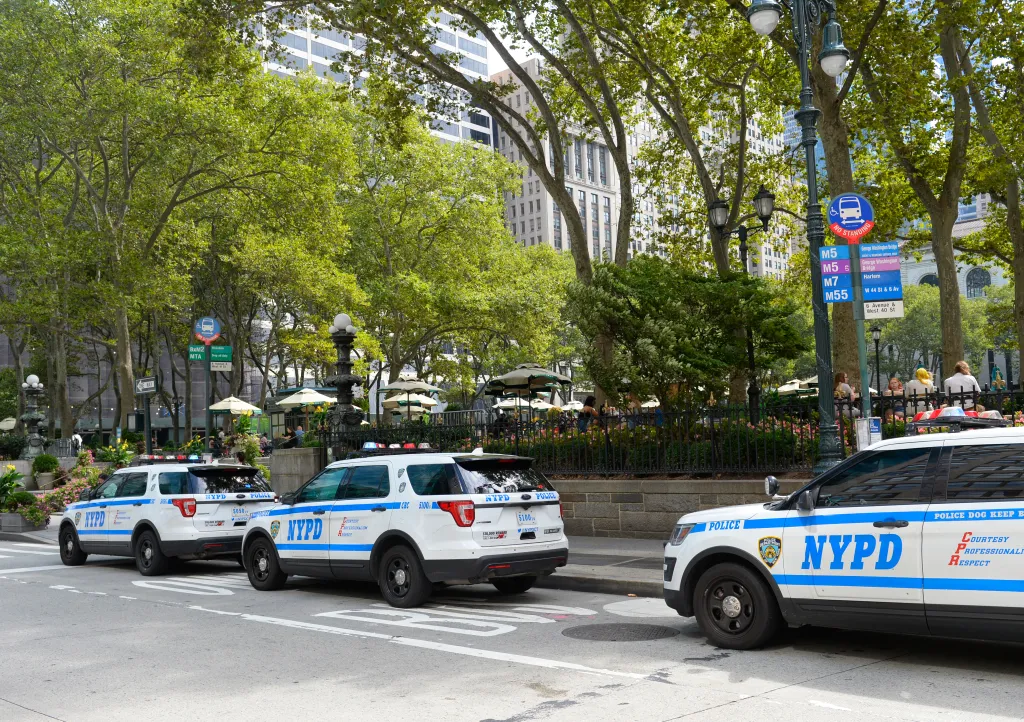 NYPD Critical Response Command (CRC) team vehicles parked outside Bryant Park in Manhattan.