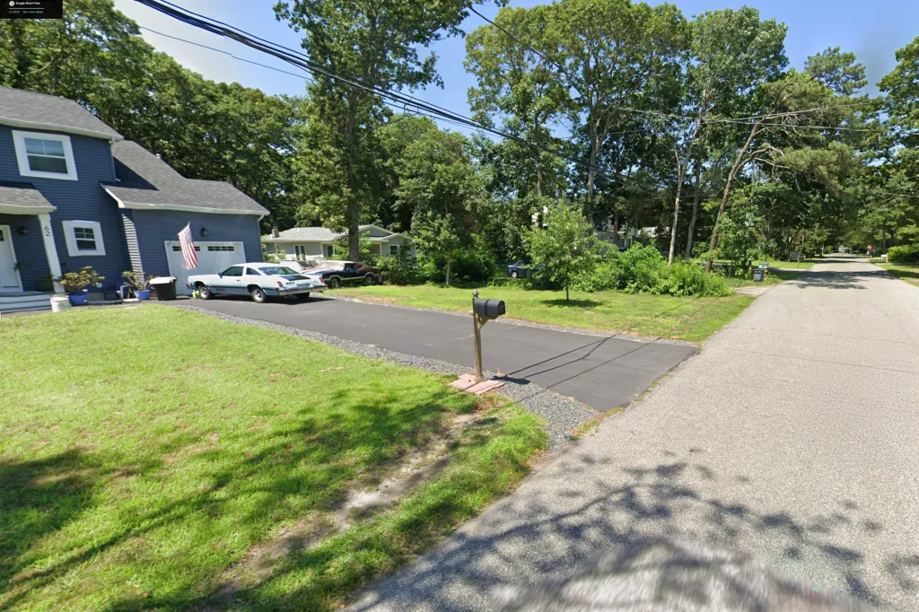 Residential house at 62 Mill Drive, Mastic Beach, Long Island.