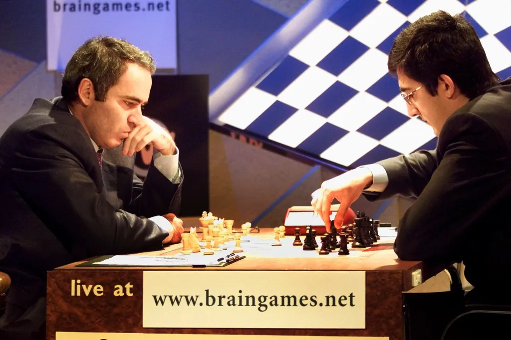 Vladimir Kramnik makes a move against Gary Kasparov during their World Chess Championship's on Nov. 2, 2000.