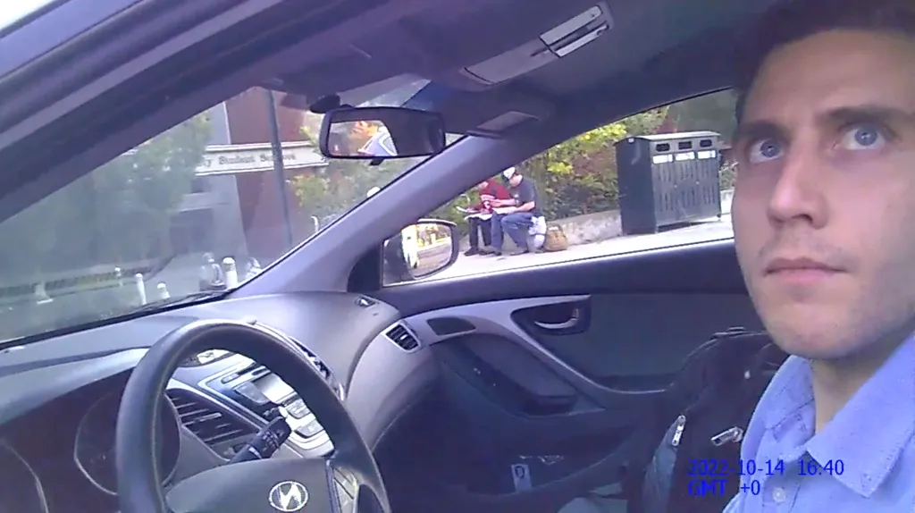 Bryan Kohberger in his car during a traffic stop for running a red light.