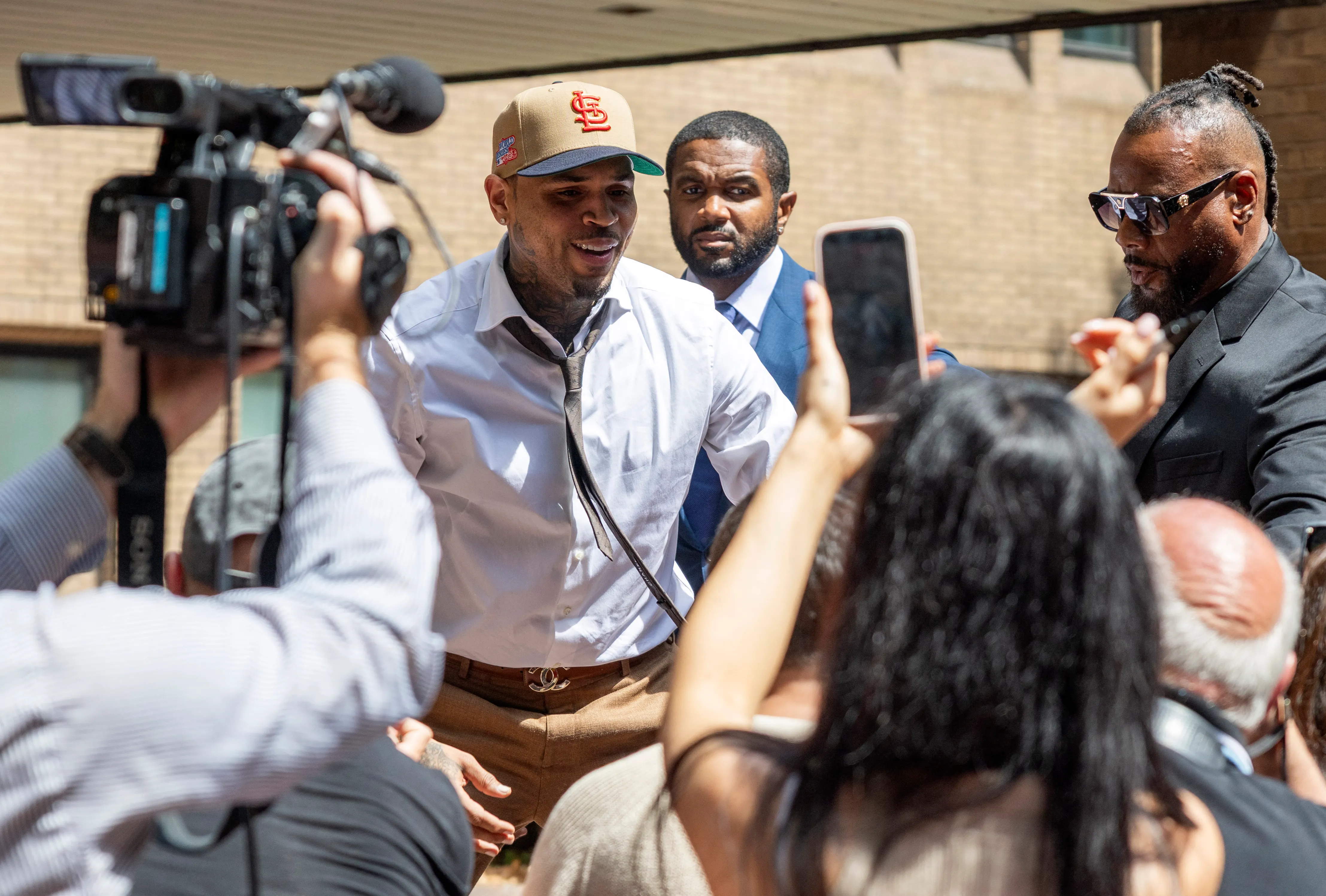Chris Brown arrives at Southwark Crown Court in London on July 24