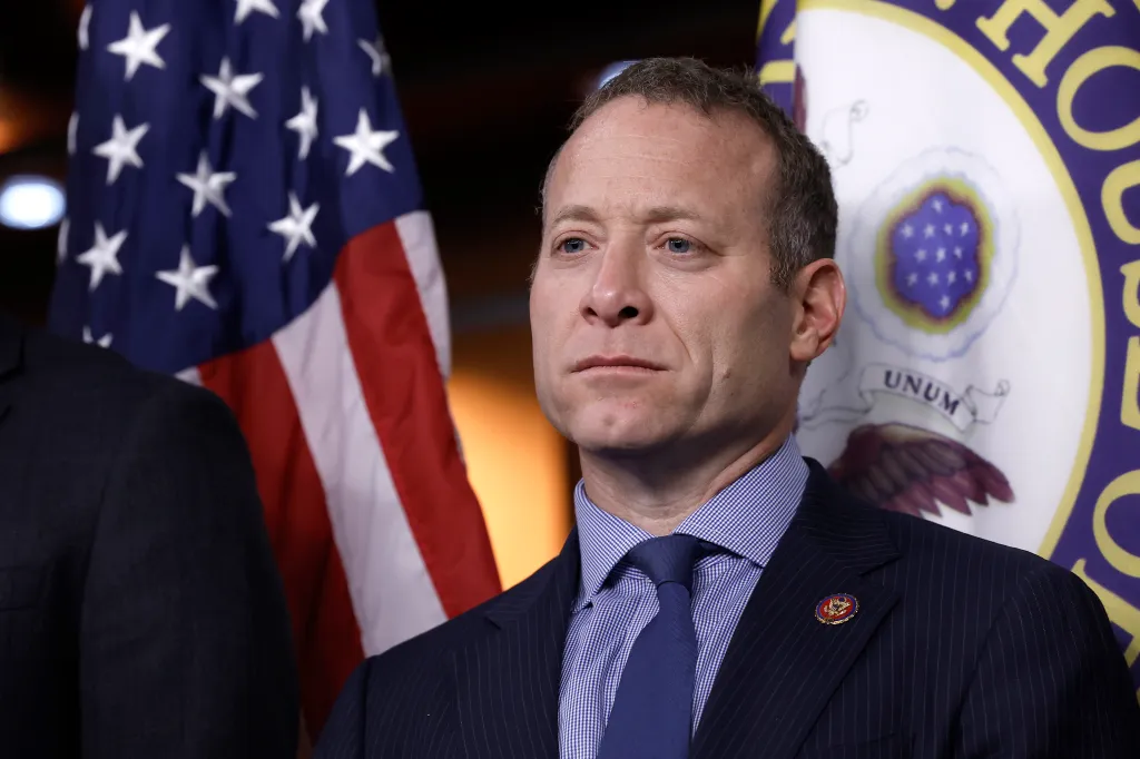 Rep. Josh Gottheimer listening during a press conference about new Holocaust education legislation.