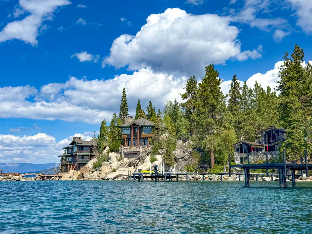 Shoreline homes with piers on Lake Tahoe at Zephyr Cove, Nevada.