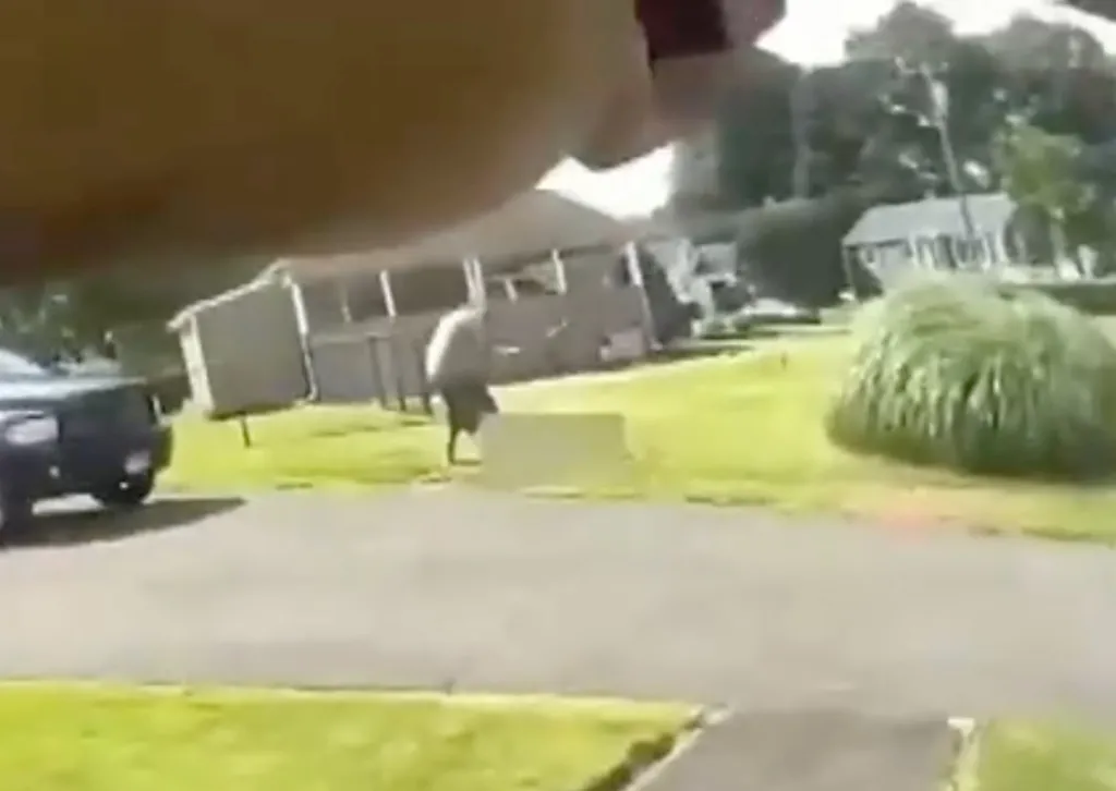 Police bodycam video showing Robert Lee Jenkins III striking a man with a baseball bat.