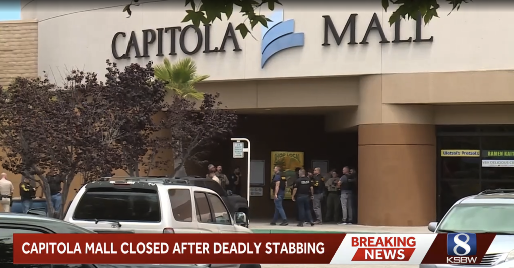 Capitola Mall entrance with police gathered after a deadly stabbing, with a news chyron stating 