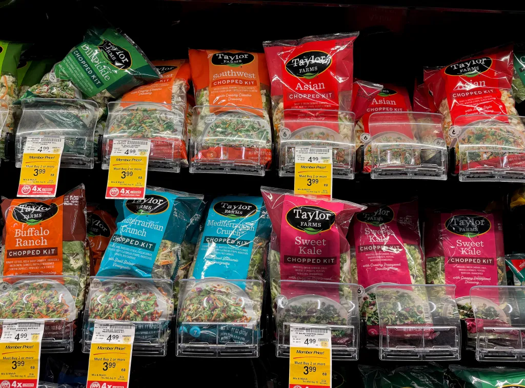 Packages of Taylor Farms salad greens on display at a Safeway store.