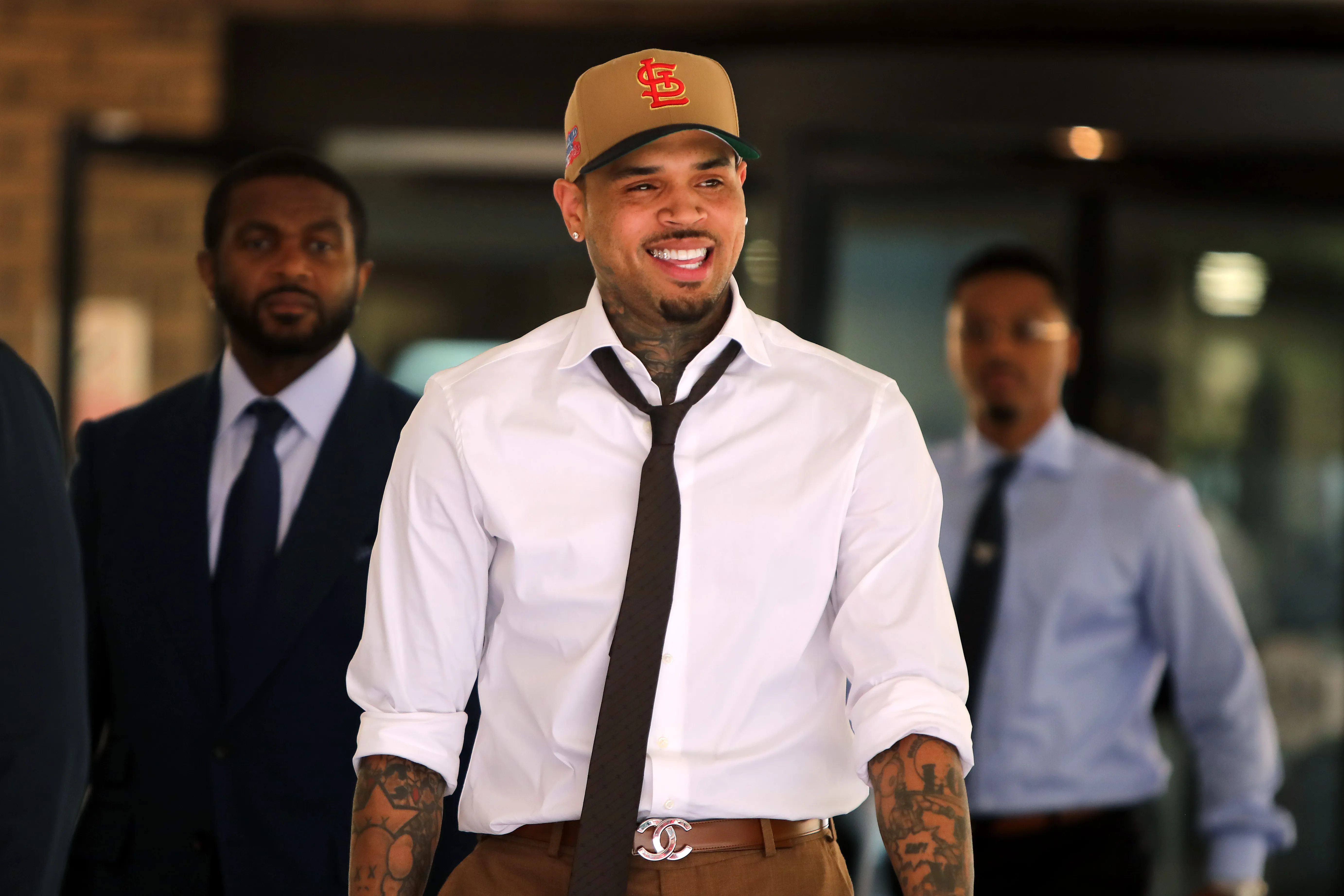 Chris Brown leaves Southwark Crown Court in London on July 24