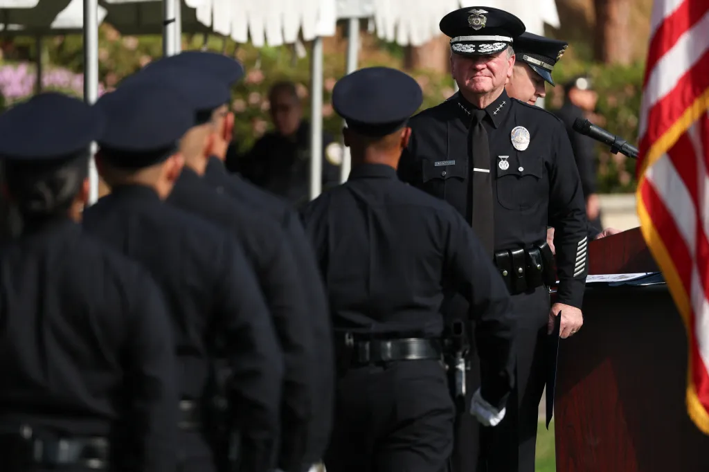 LAPD Chief Jim McDonnell facing new recruits at a graduation ceremony.