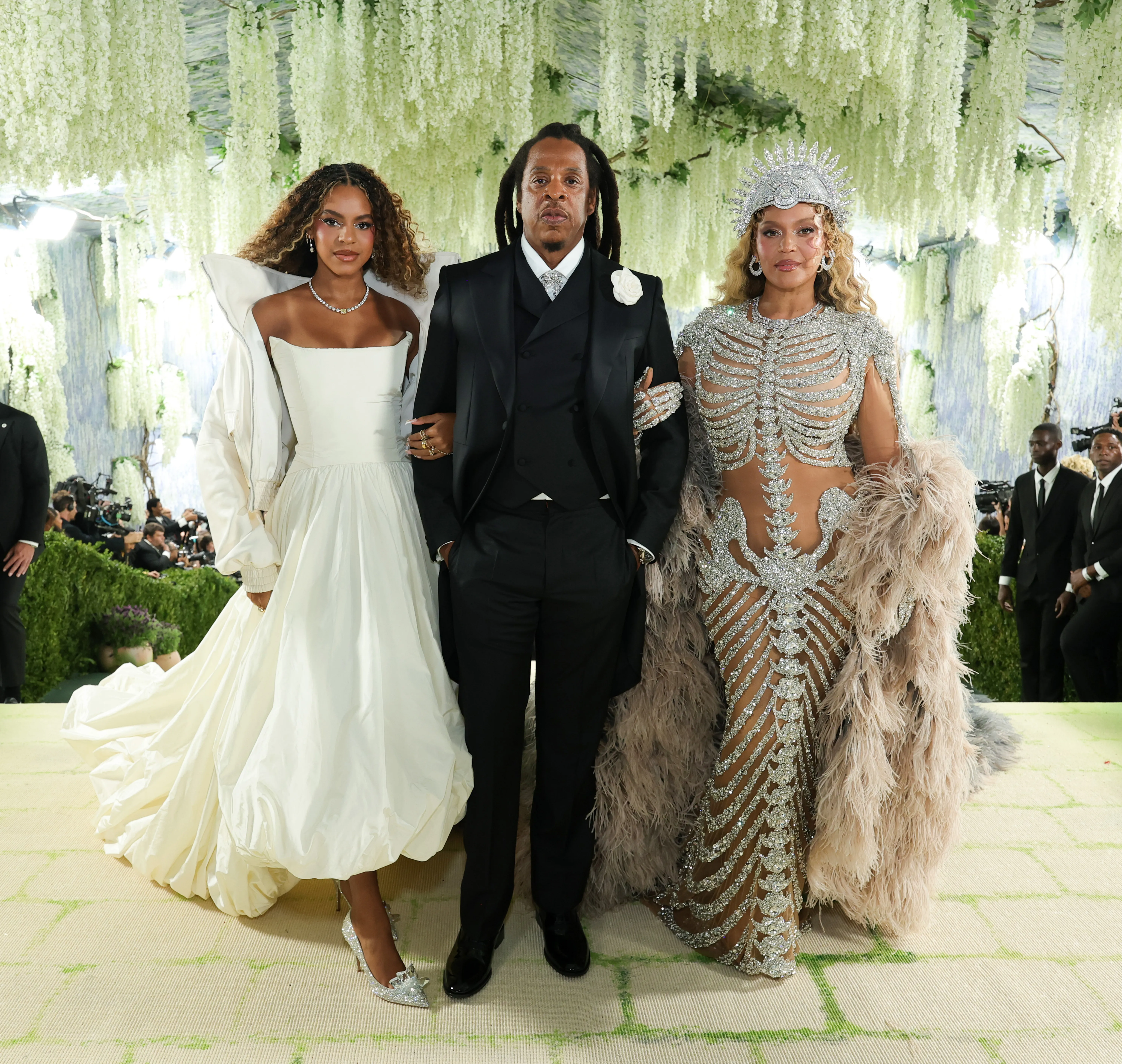 Blue Ivy Carter, Jay-Z, and Beyoncé pose on the red carpet for the 2026 Met Gala.