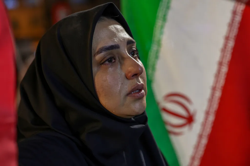 An Iranian woman cries during a rally in Tehran.