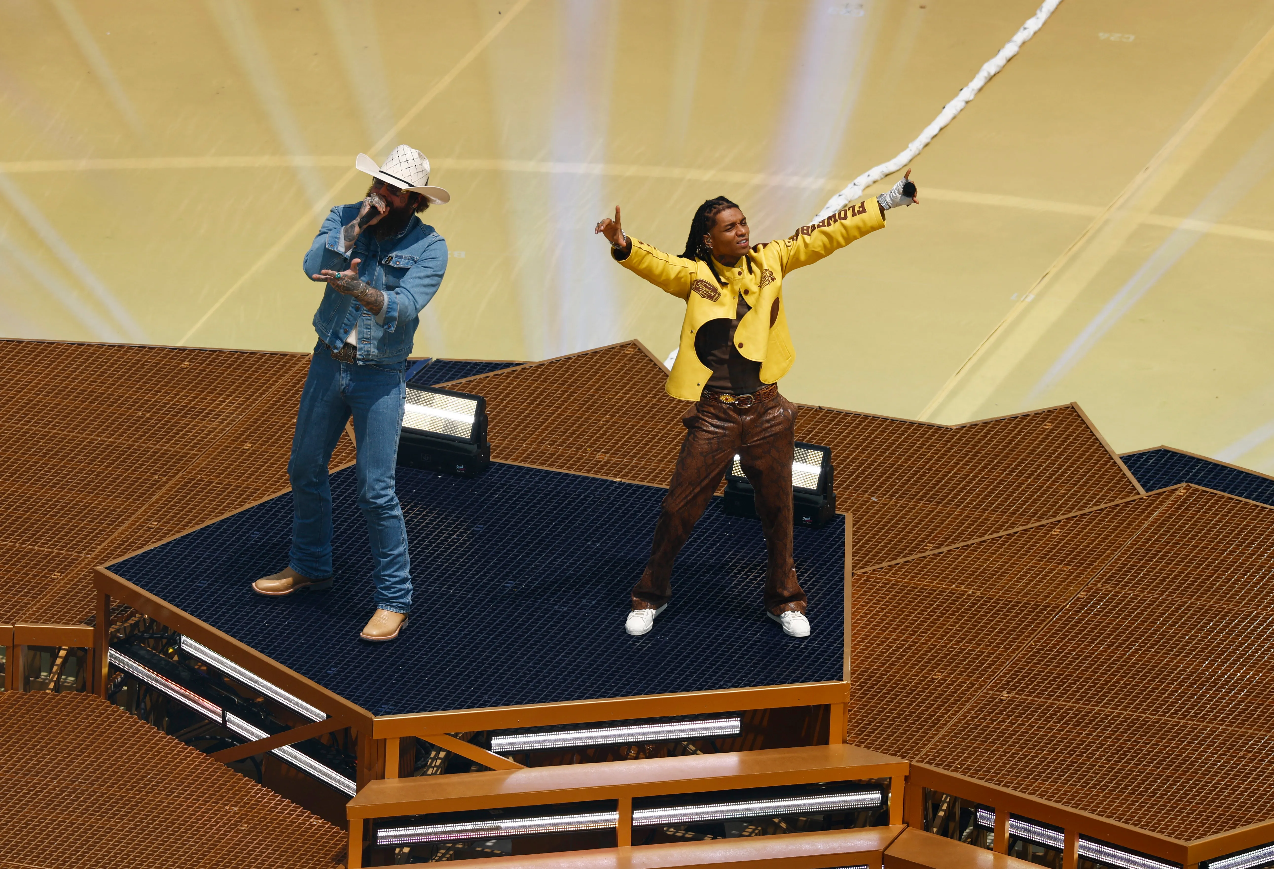 Singers Post Malone and Swae Lee perform during the closing ceremony.