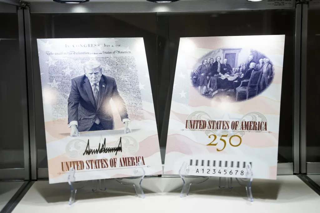 Two placards with images of Donald Trump and the signing of the Declaration of Independence, displayed for the Great American State Fair.