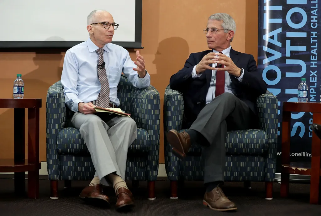 Lawrence Gostin and Dr. Anthony Fauci participating in a panel discussion on the Zika virus.