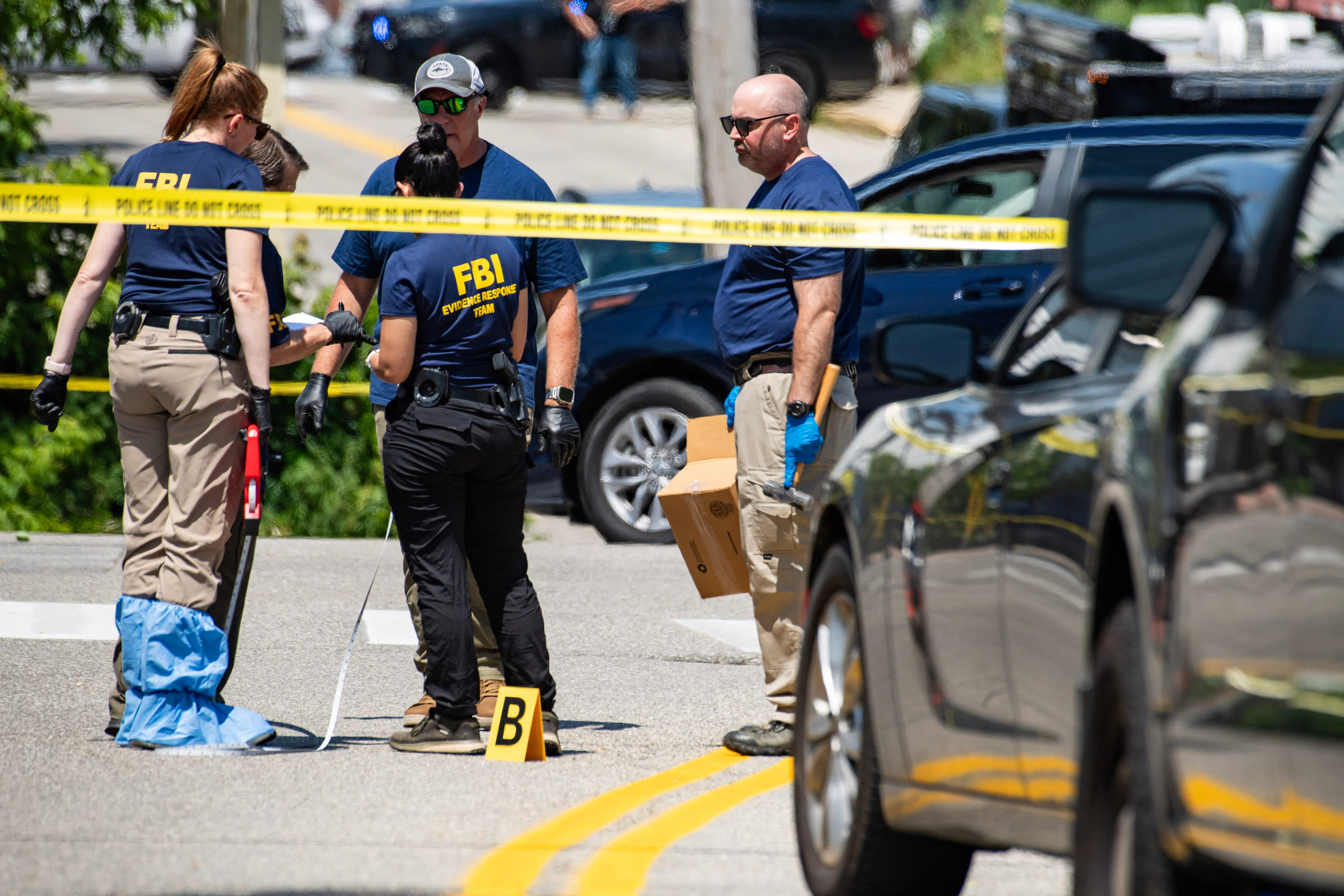 FBI investigators work the scene of an alleged ICE involved shooting in Biddeford, Maine, on July 13, 2026.