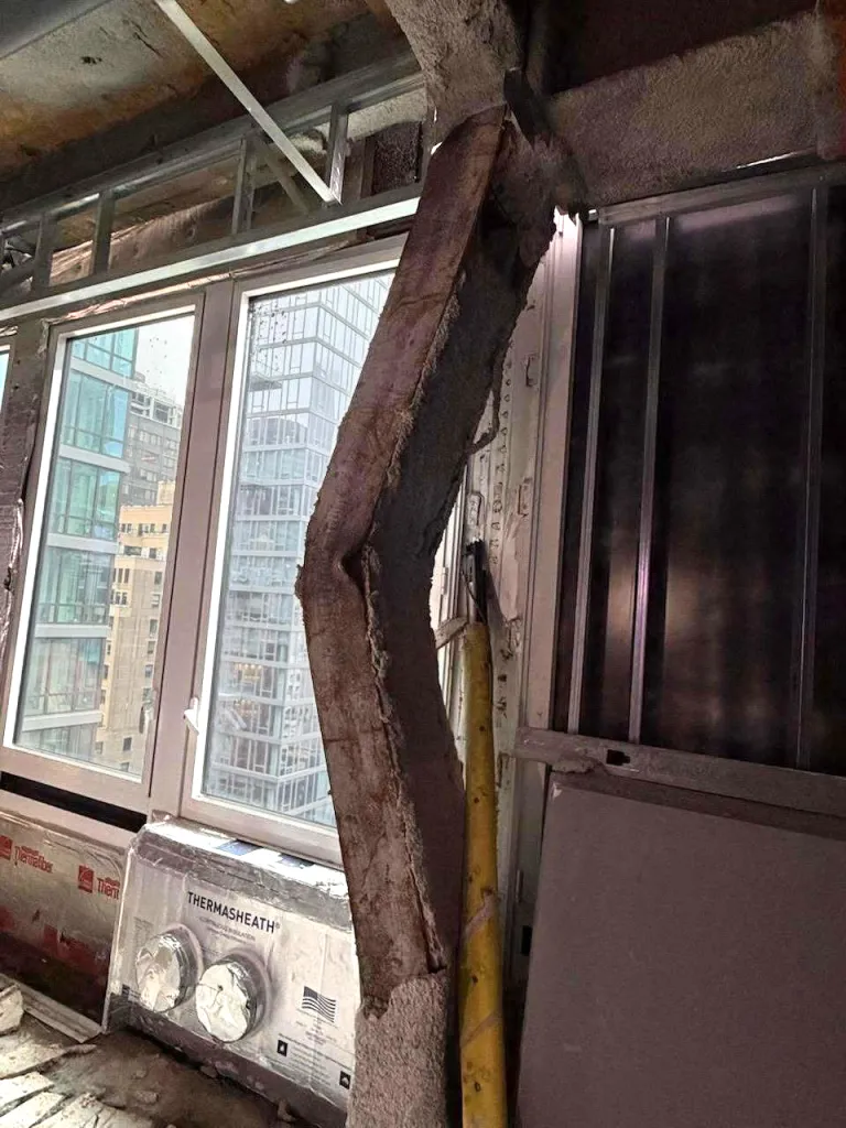 Buckled support column on the 21st floor of a building.