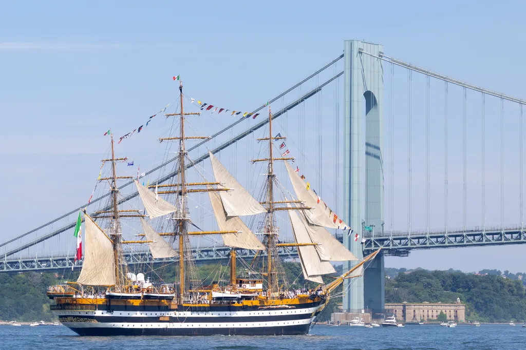 A tall ship sails toward the Verrazano Bridge.
