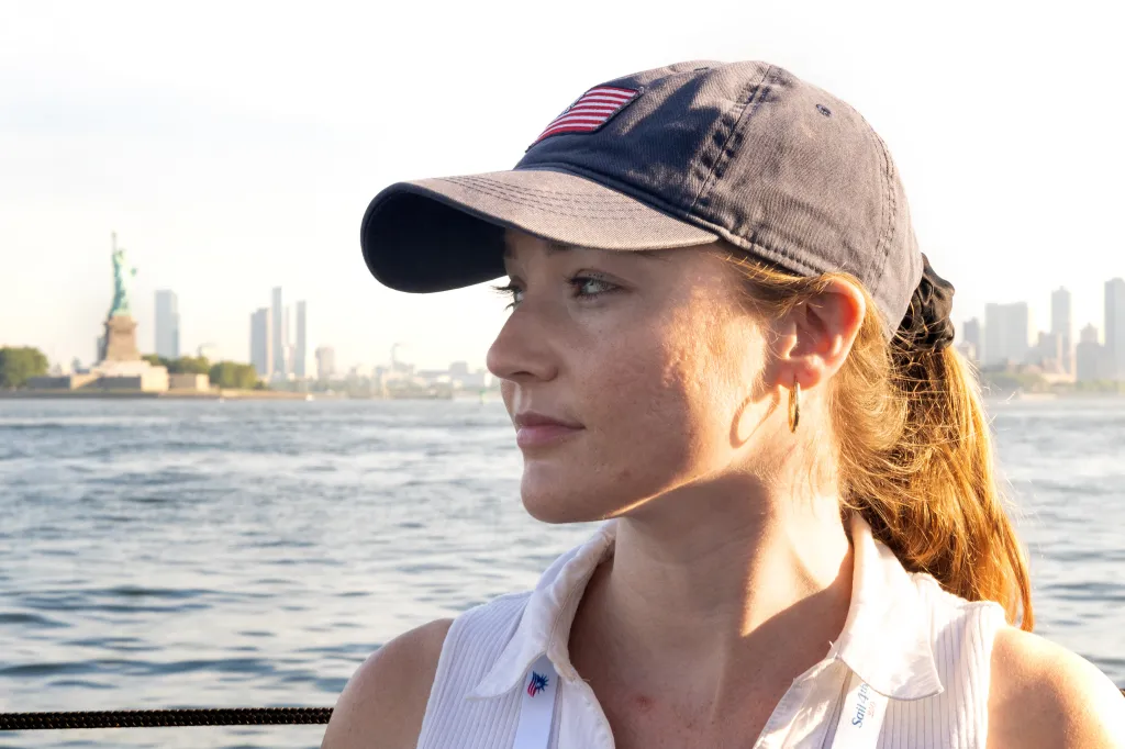 NY Post reporter Katie Donlevy on the America 2.0 boat while near the Statue of Liberty. 
