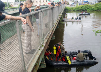 Divers Search a New Jersey River for Second of 2 Children They Fear Drowned