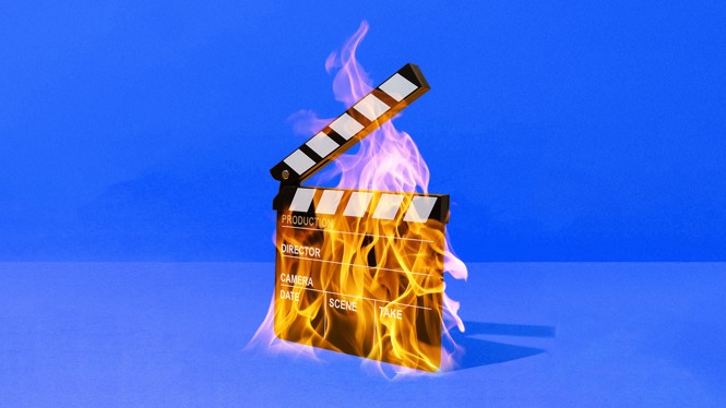 A clapboard on fire on a field of blue