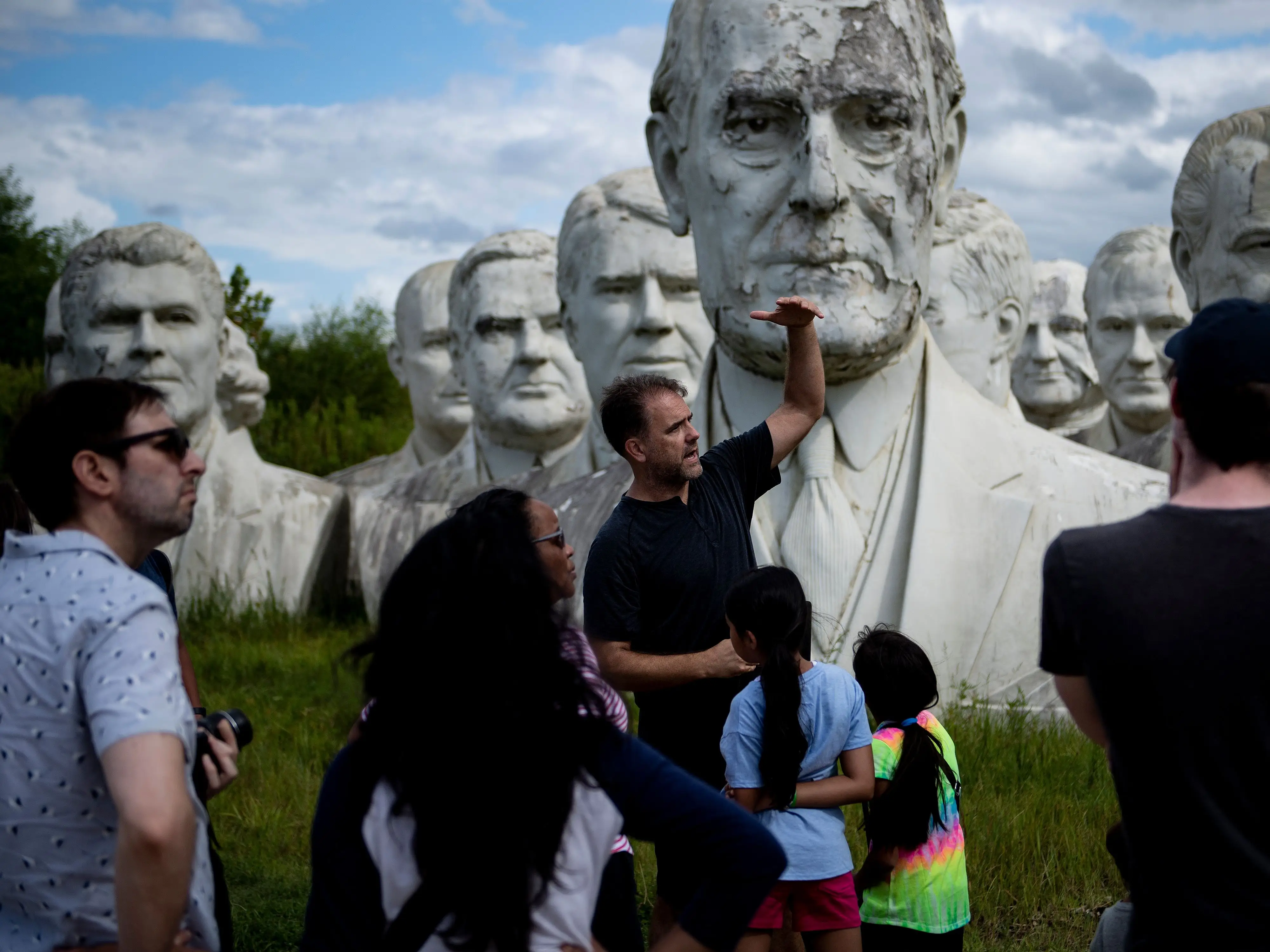 John Plashal gives a tour of the busts in 2019.
