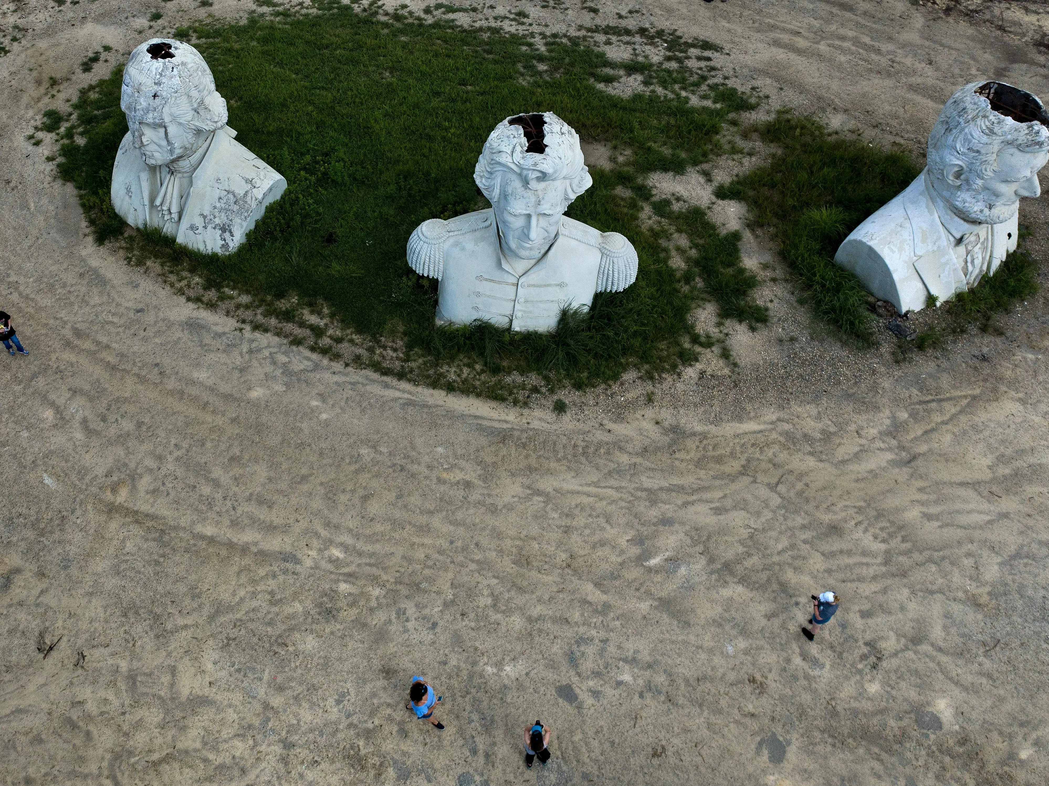 An aerial view shows that many of the heads have caved in.