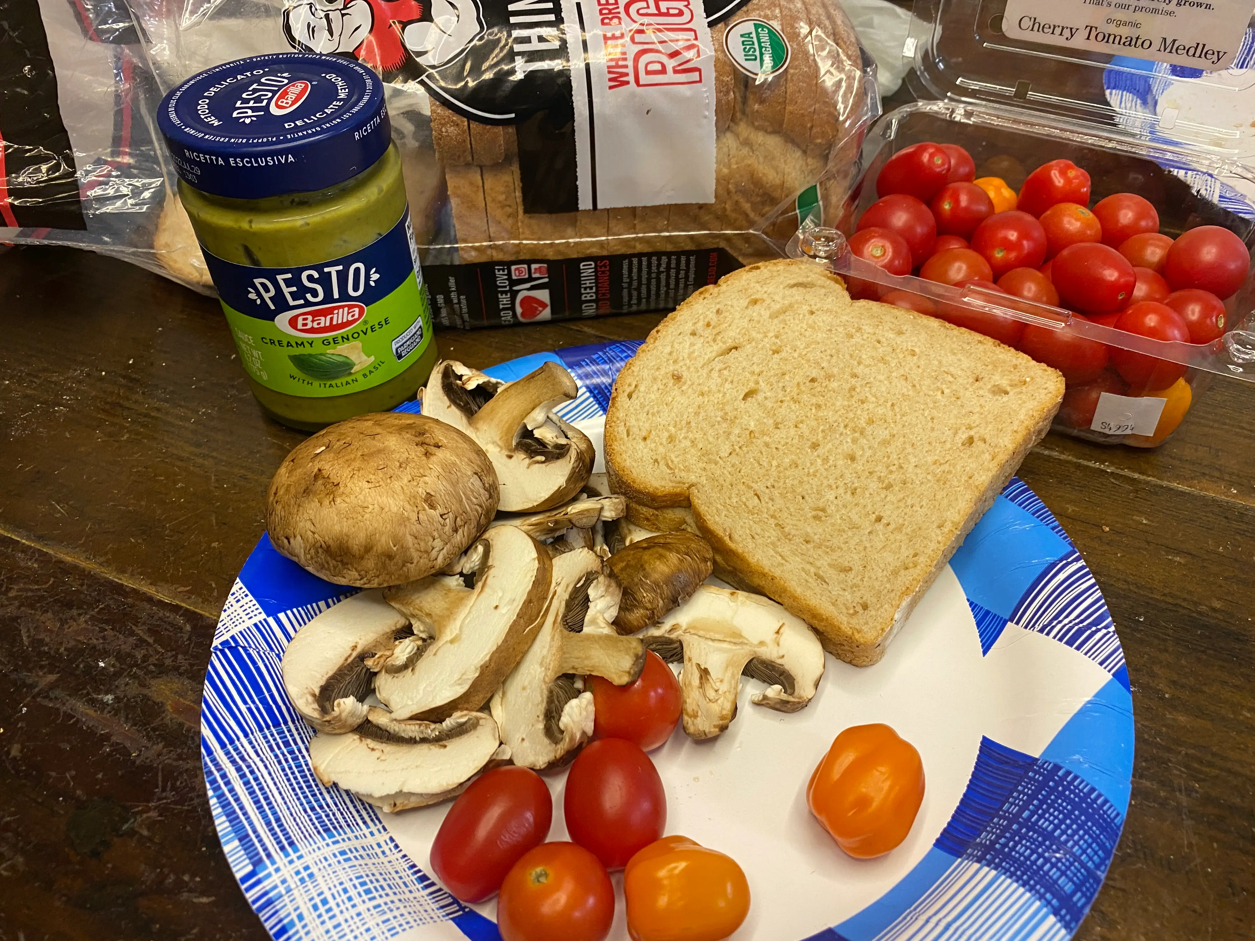 pesto, mushrooms, cherry tomatoes, and bread