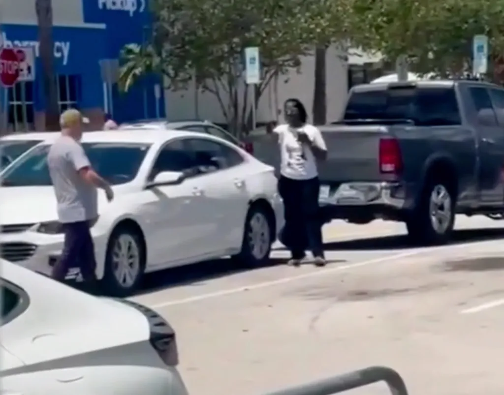 Video captured the tense argument between a woman with a gun and Bart Diguglielmo before he was allegedly shot in a Walmart parking lot on June 30, 2026.