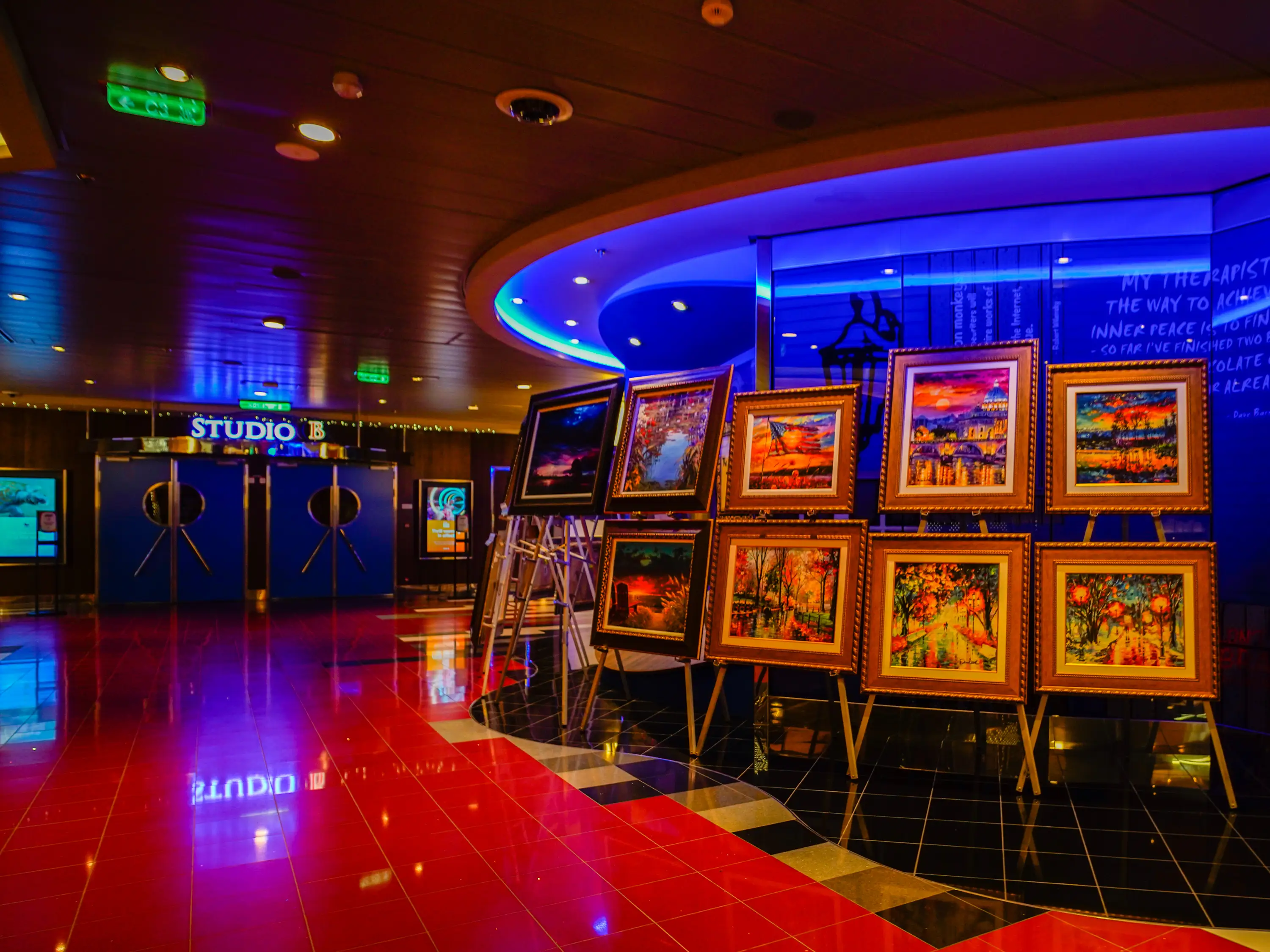 Art on display at the entrance to Studio B on deck four.